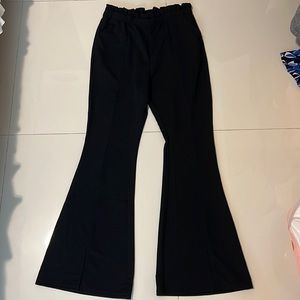 Black flare pants with small slits